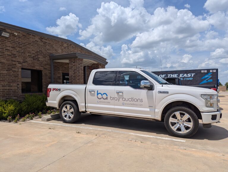 Bray Auctions vehicle vinyl lettering on white f150.